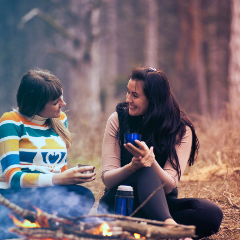 An image of 2 women communicating and listening to each other