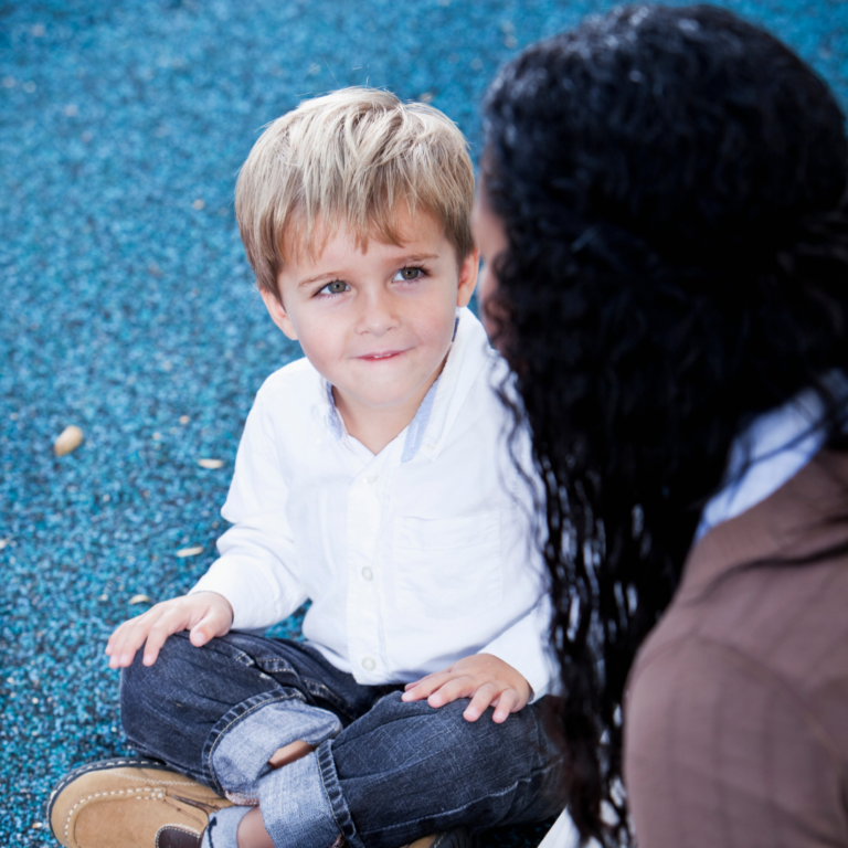 A practitioner and a child interacting