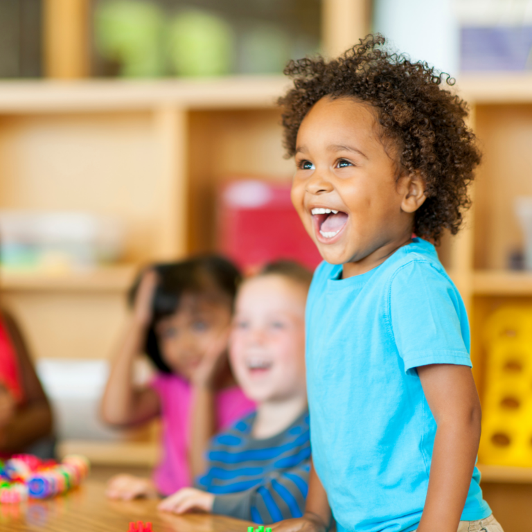 Image of a smiling child looking excited and motivated