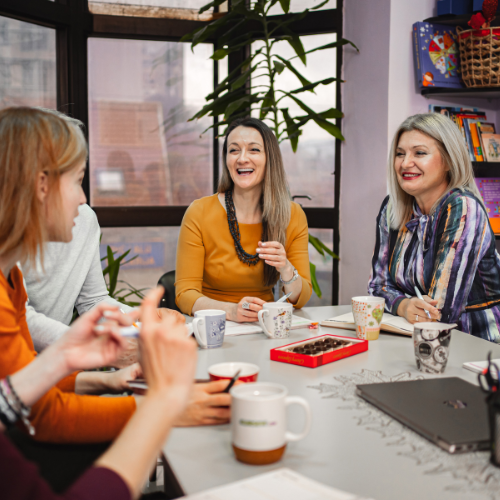 An image of staff in a meeting