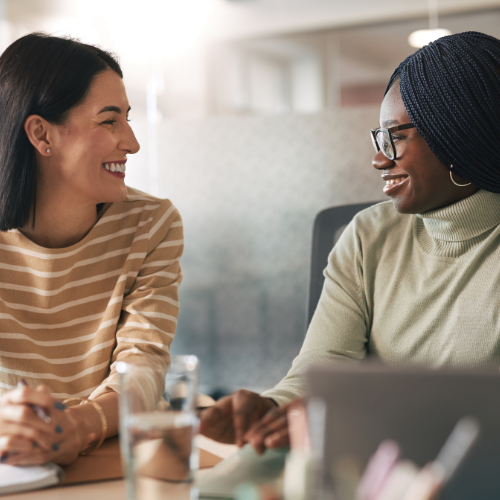 An image of a manager and a team member having a meeting